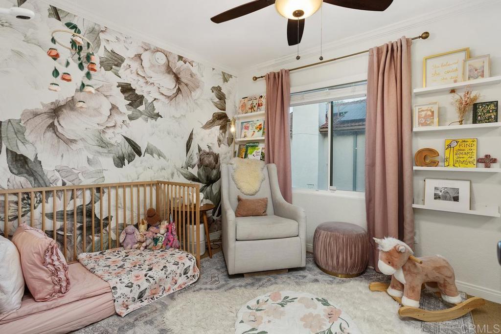 2063 Wandering Road Encinitas, CA 92024 - Photo 15 of 23 a bedroom with furniture and a large window