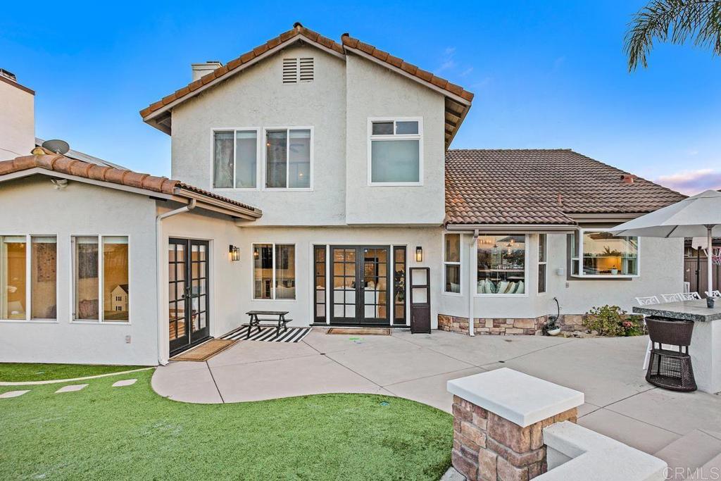 2063 Wandering Road Encinitas, CA 92024 - Photo 20 of 23 a front view of a house with a yard