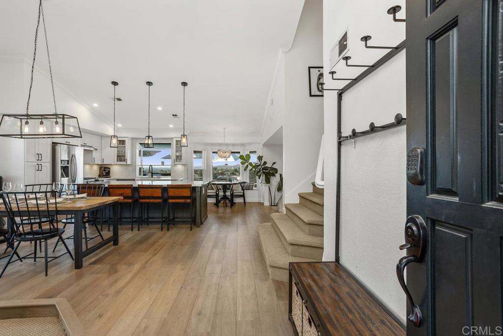 2063 Wandering Road Encinitas, CA 92024 - Photo 2 of 23 a view of a kitchen and dining room
