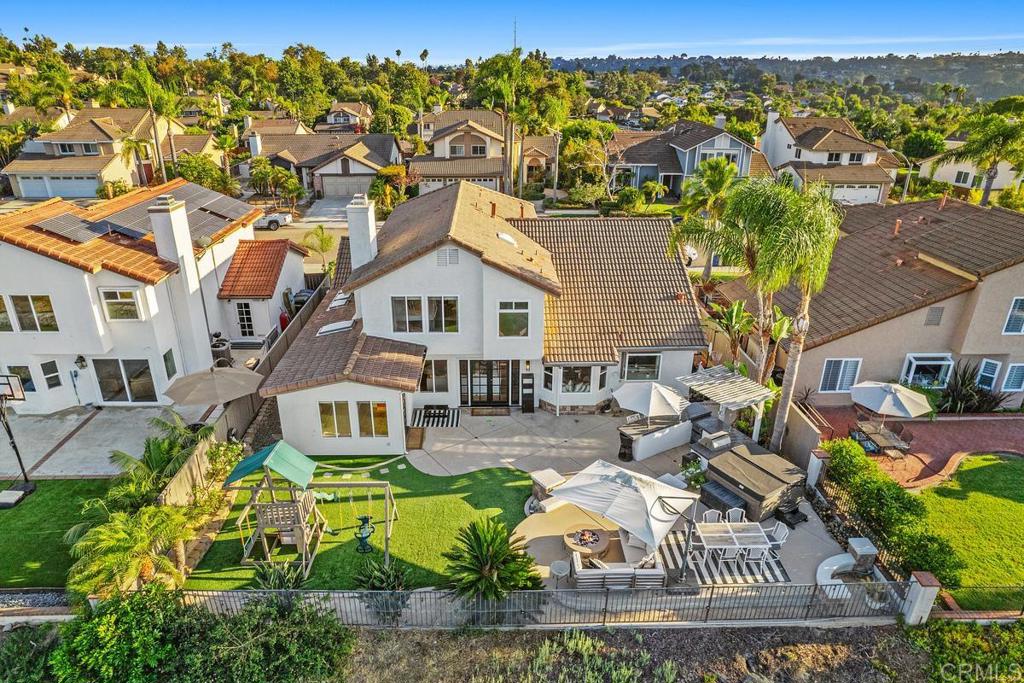 2063 Wandering Road Encinitas, CA 92024 - Photo 21 of 23 an aerial view of a house with garden space and ocean view