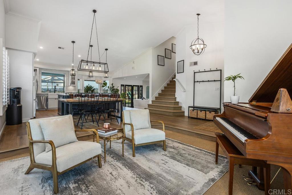 2063 Wandering Road Encinitas, CA 92024 - Photo 4 of 23 a living room with furniture and wooden floor