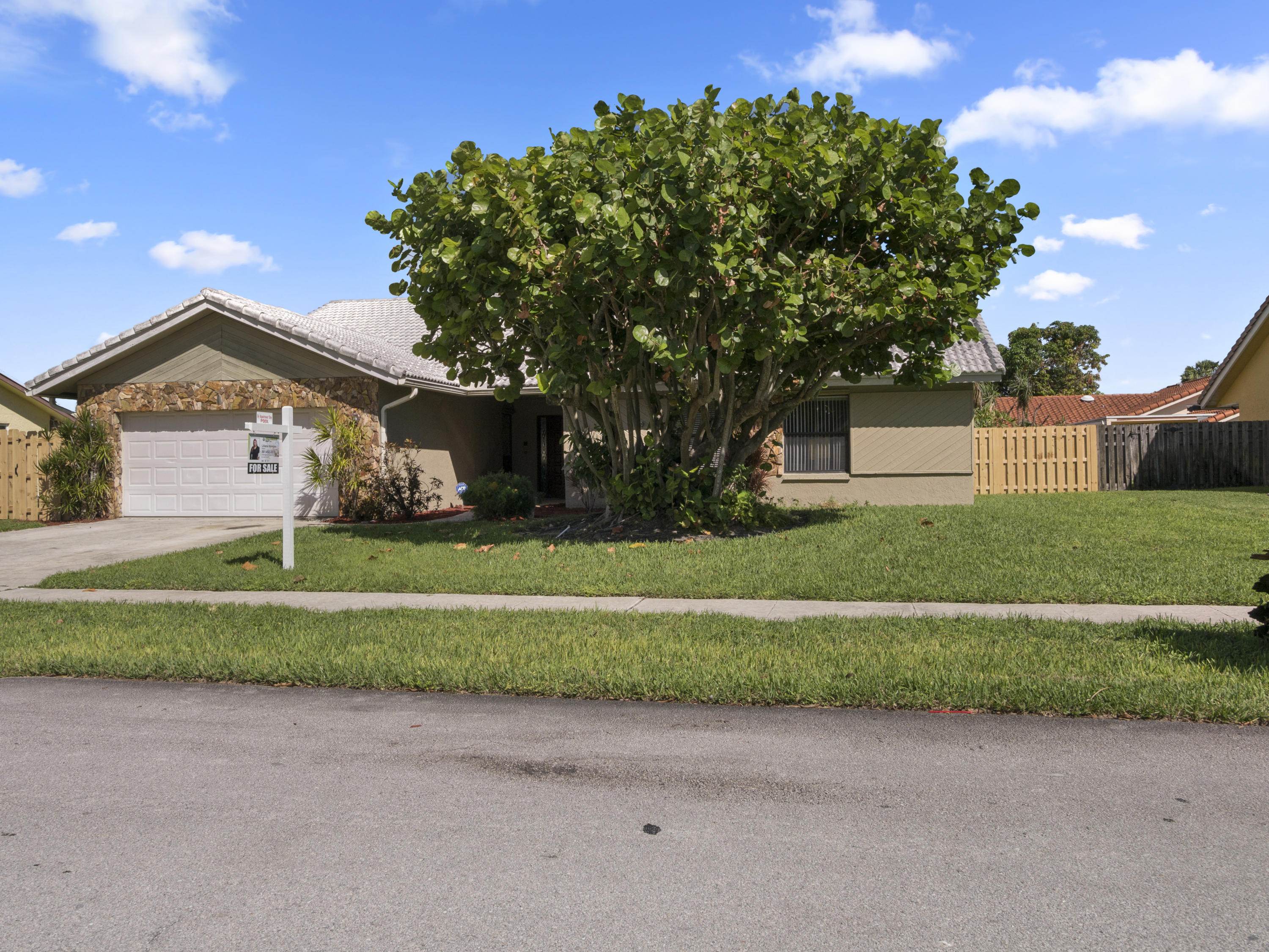 1355 Northwest 14th Street Boca Raton, FL 33486 - Photo 1 of 16 FRONT