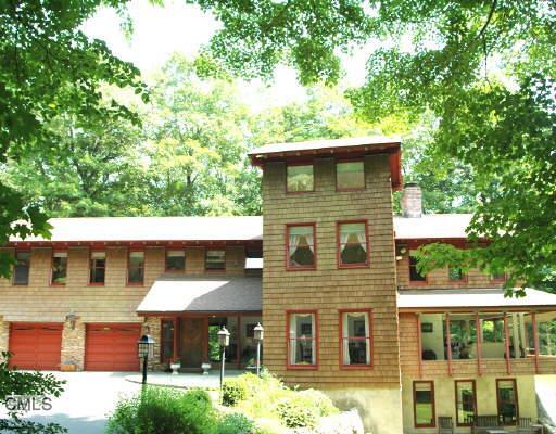 386 Taconic Road Stamford, CT 06831 - Photo 1 of 1 a view of a house with a yard