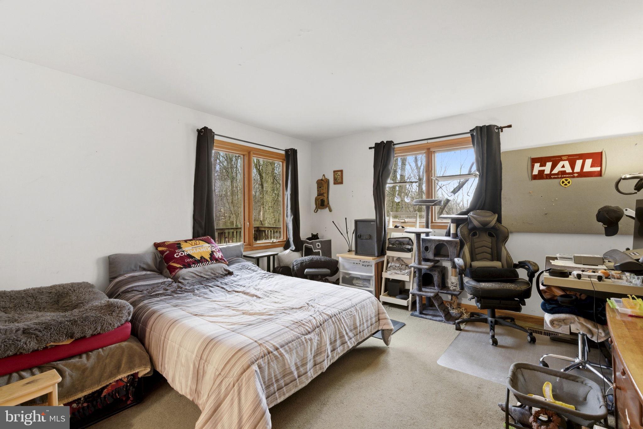 1655 Old Elk Neck Road Elkton, MD 21921 - Photo 12 of 43 a bedroom with a bed and a window