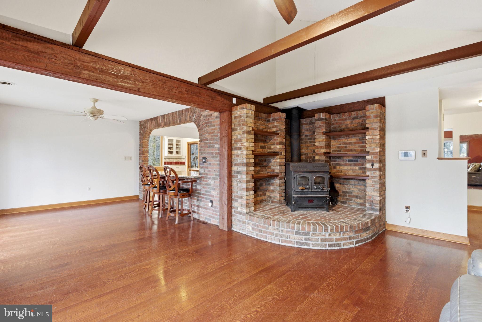 1655 Old Elk Neck Road Elkton, MD 21921 - Photo 3 of 43 a view of a dining room with furniture and wooden floor