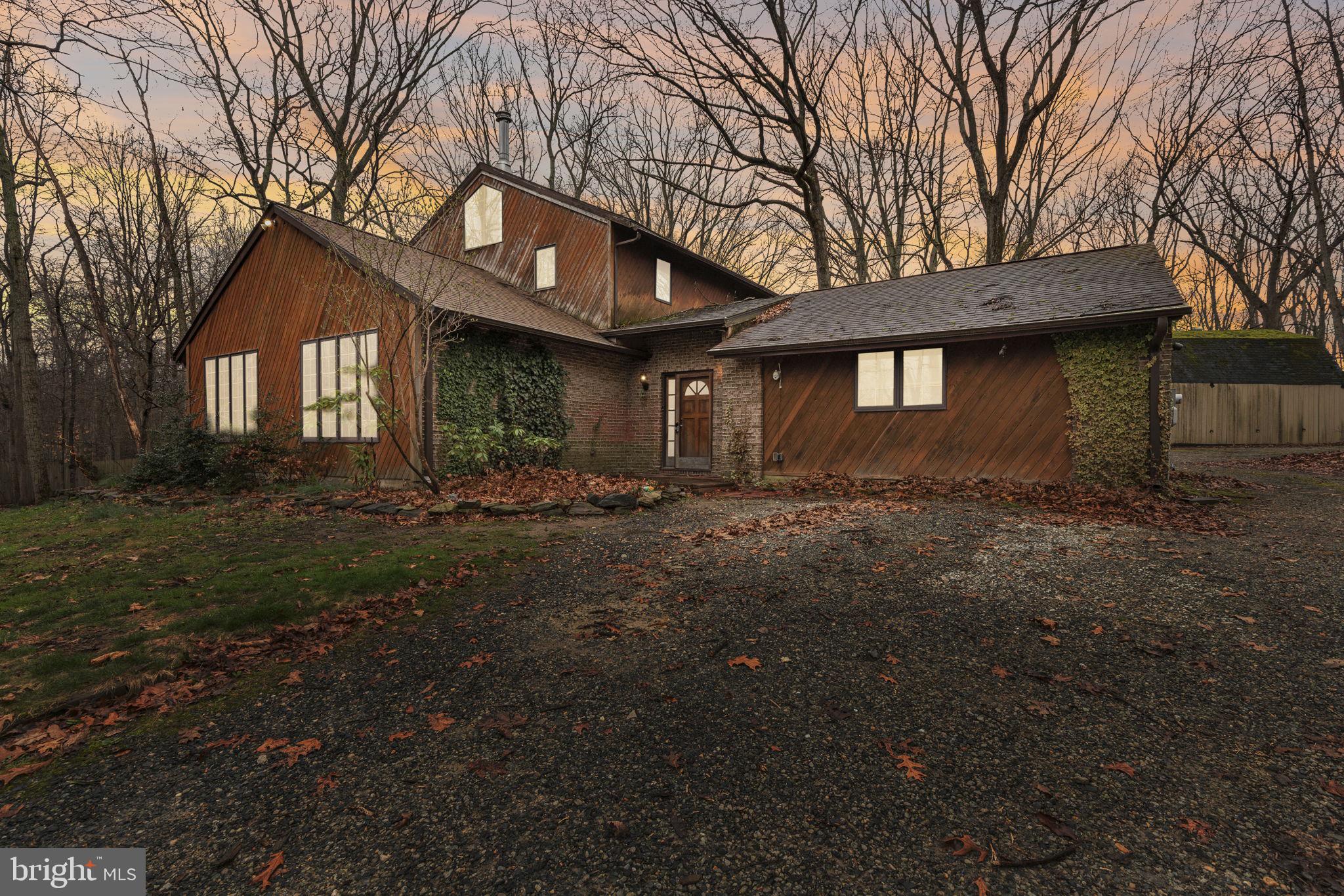 1655 Old Elk Neck Road Elkton, MD 21921 - Photo 39 of 43 a front view of a house with a yard