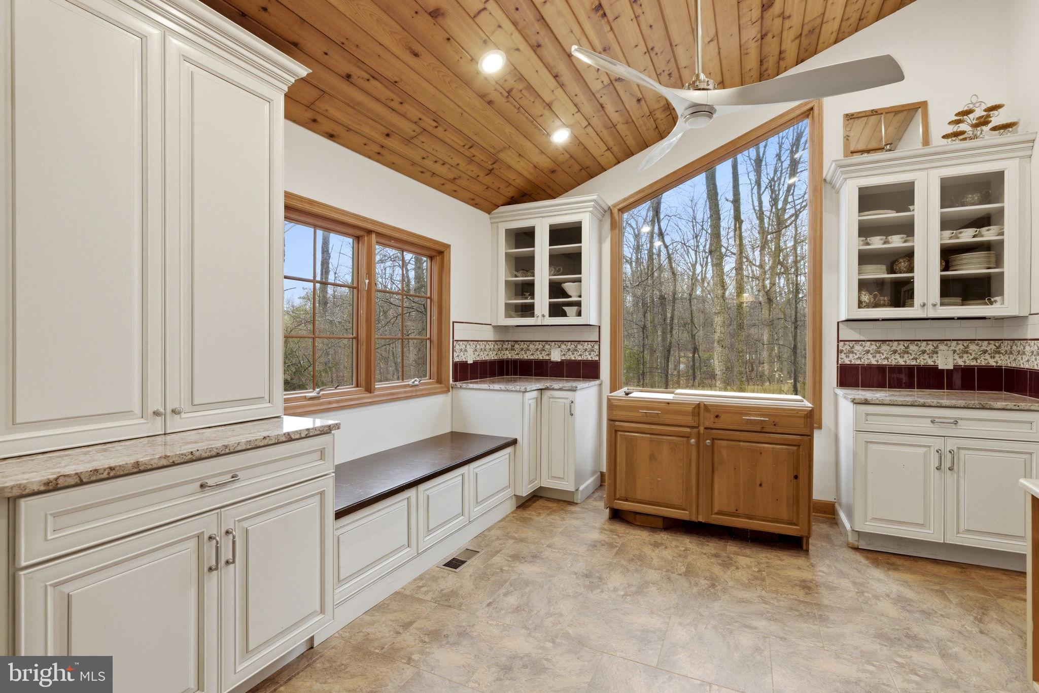 1655 Old Elk Neck Road Elkton, MD 21921 - Photo 10 of 43 a large white kitchen with cabinets