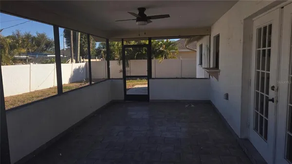 a view of a living room with a large window
