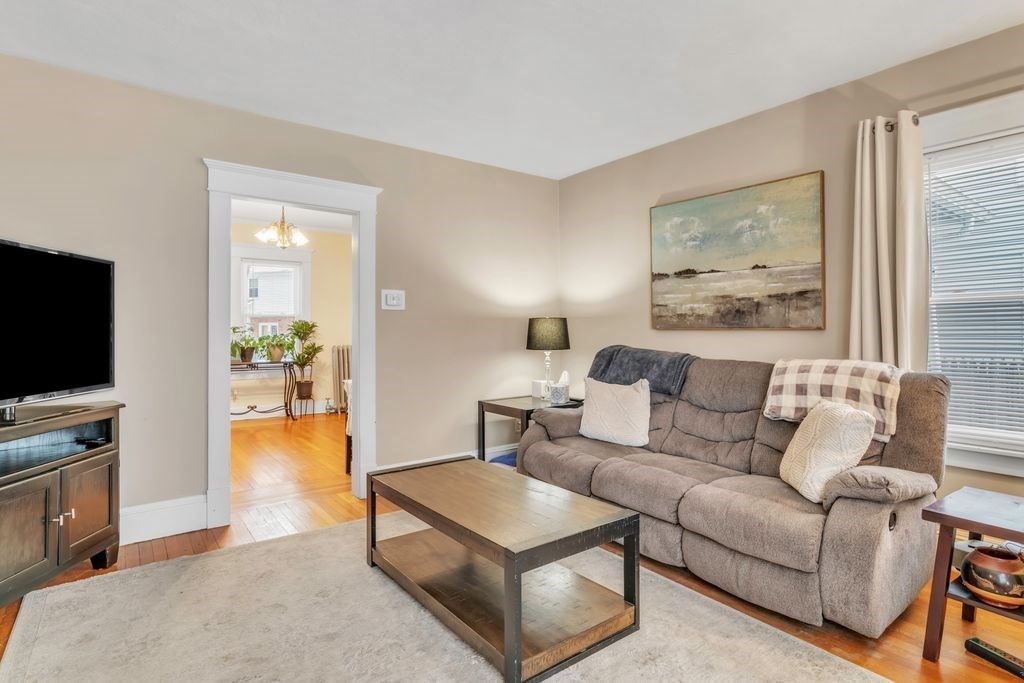754 White Street Springfield, MA 01108 - Photo 13 of 41 a living room with furniture and a flat screen tv