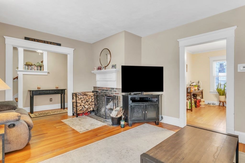 754 White Street Springfield, MA 01108 - Photo 14 of 41 a bedroom with a bed and a flat screen tv