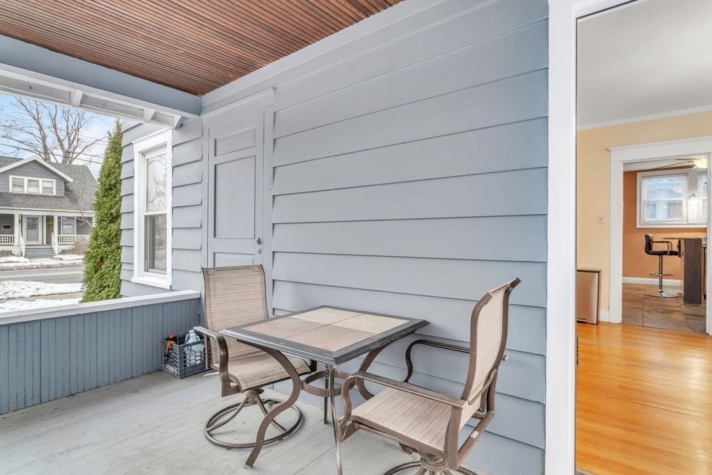 754 White Street Springfield, MA 01108 - Photo 18 of 41 a balcony with table and chairs