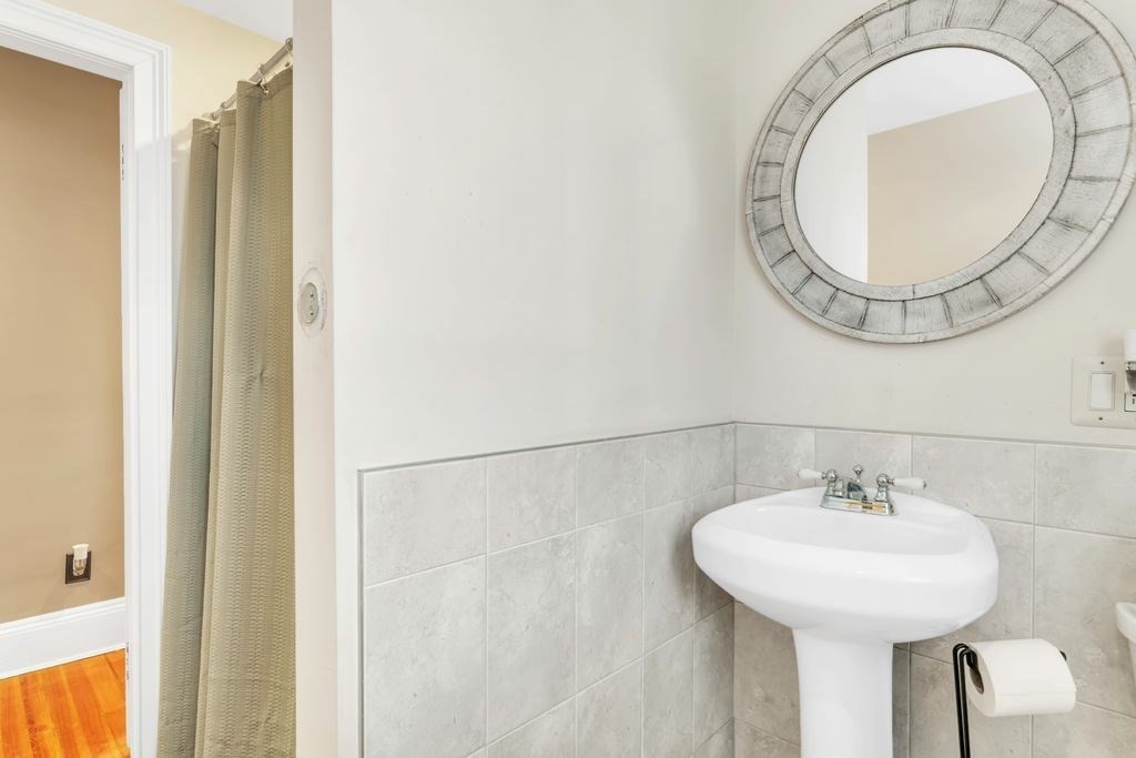 754 White Street Springfield, MA 01108 - Photo 20 of 41 a bathroom with a sink and a mirror