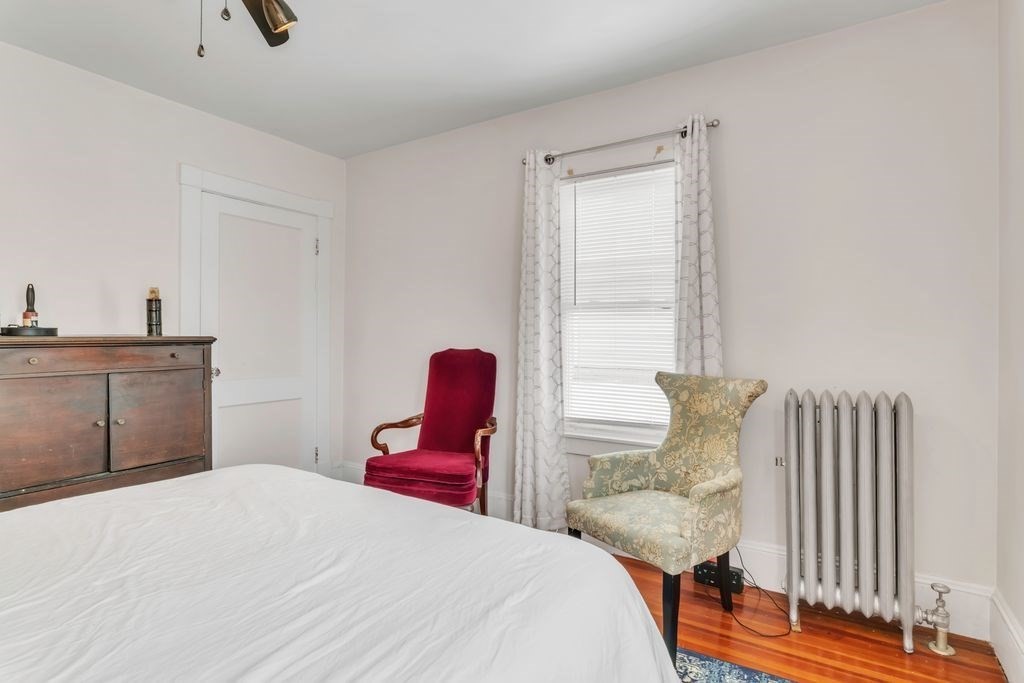 754 White Street Springfield, MA 01108 - Photo 31 of 41 a bedroom with bed and window
