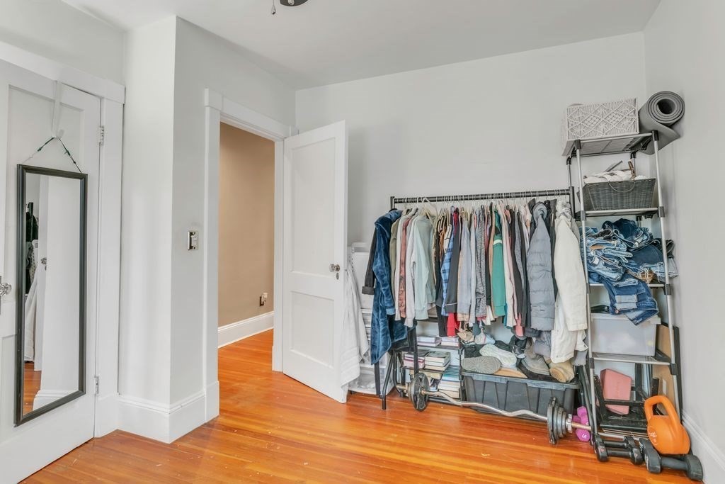754 White Street Springfield, MA 01108 - Photo 34 of 41 a view of walk in closet with clothes and shoes