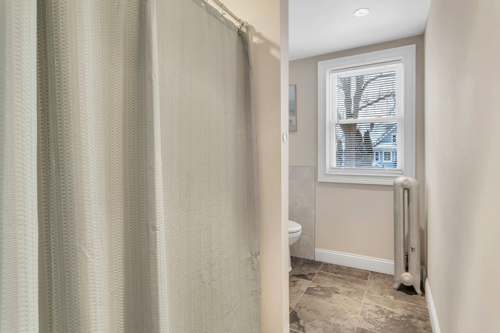 754 White Street Springfield, MA 01108 - Photo 37 of 41 a view of a room that has a window in it