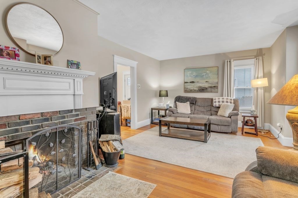 754 White Street Springfield, MA 01108 - Photo 10 of 41 a living room with furniture and a fireplace