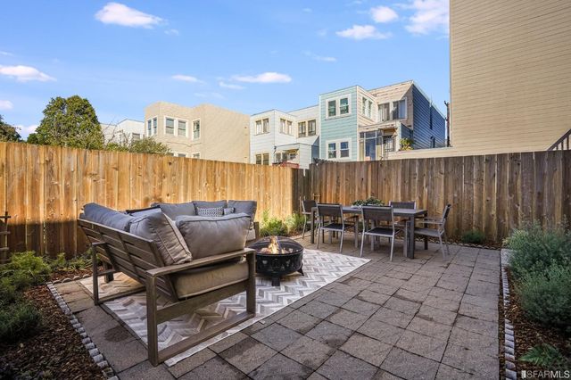 a view of a terrace with furniture