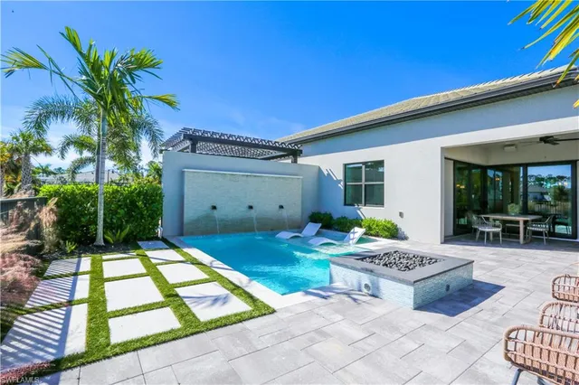 a backyard of a house with seating space