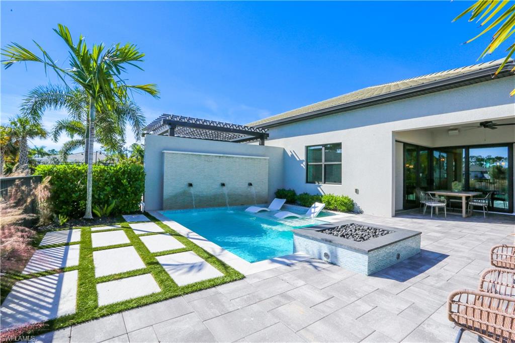 a backyard of a house with seating space