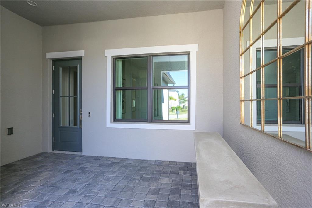 14727 Kingfisher Loop Naples, FL 34120 - Photo 6 of 50 a view of an empty room and window