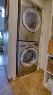 a bedroom with a bed and a closet