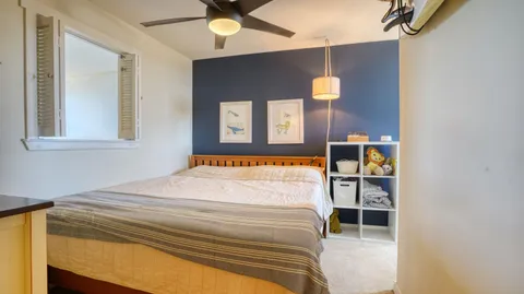 a view of front door and bedroom