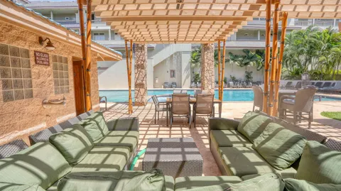 a room with gym equipment and windows