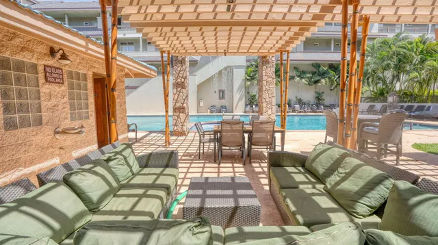 a room with gym equipment and windows