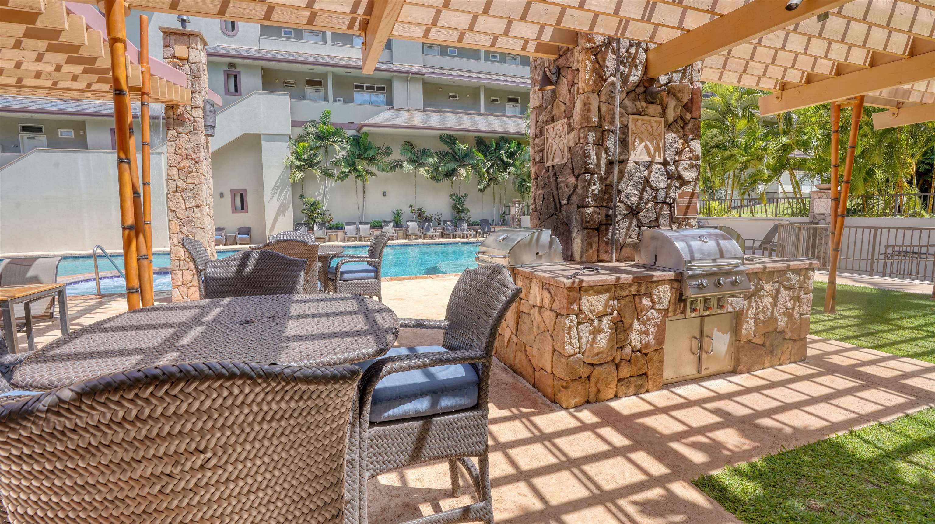 3710 Lower Honoapiilani Road, Unit F44 Lahaina, HI 96761 - Photo 39 of 41 a view of a patio with couches table and chairs and potted plants
