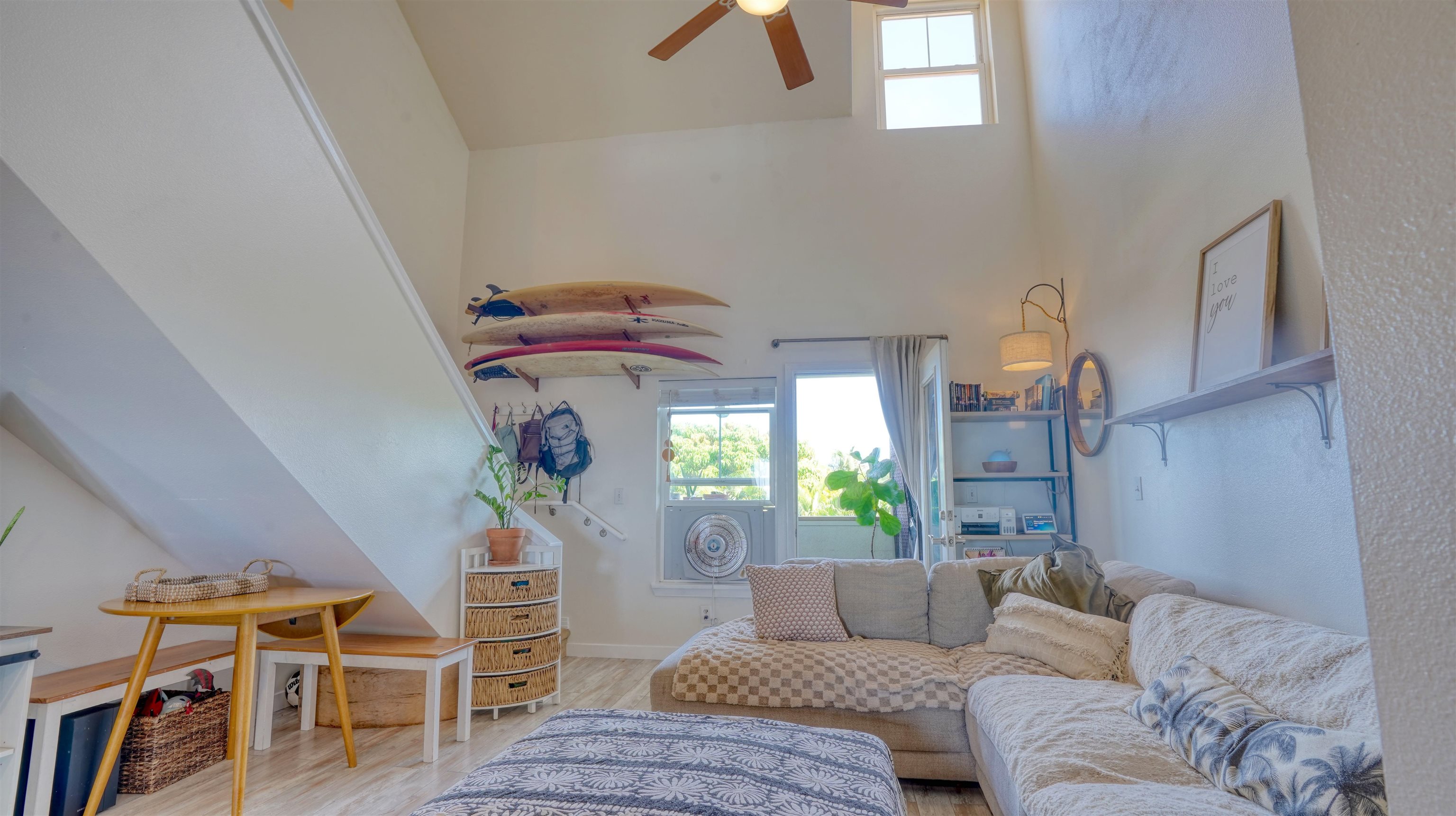 3710 Lower Honoapiilani Road, Unit F44 Lahaina, HI 96761 - Photo 4 of 41 a living room with furniture and a wooden floor
