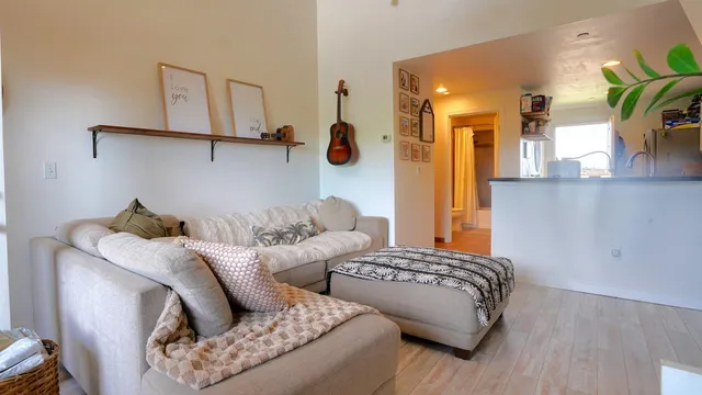 a bedroom with furniture and a window