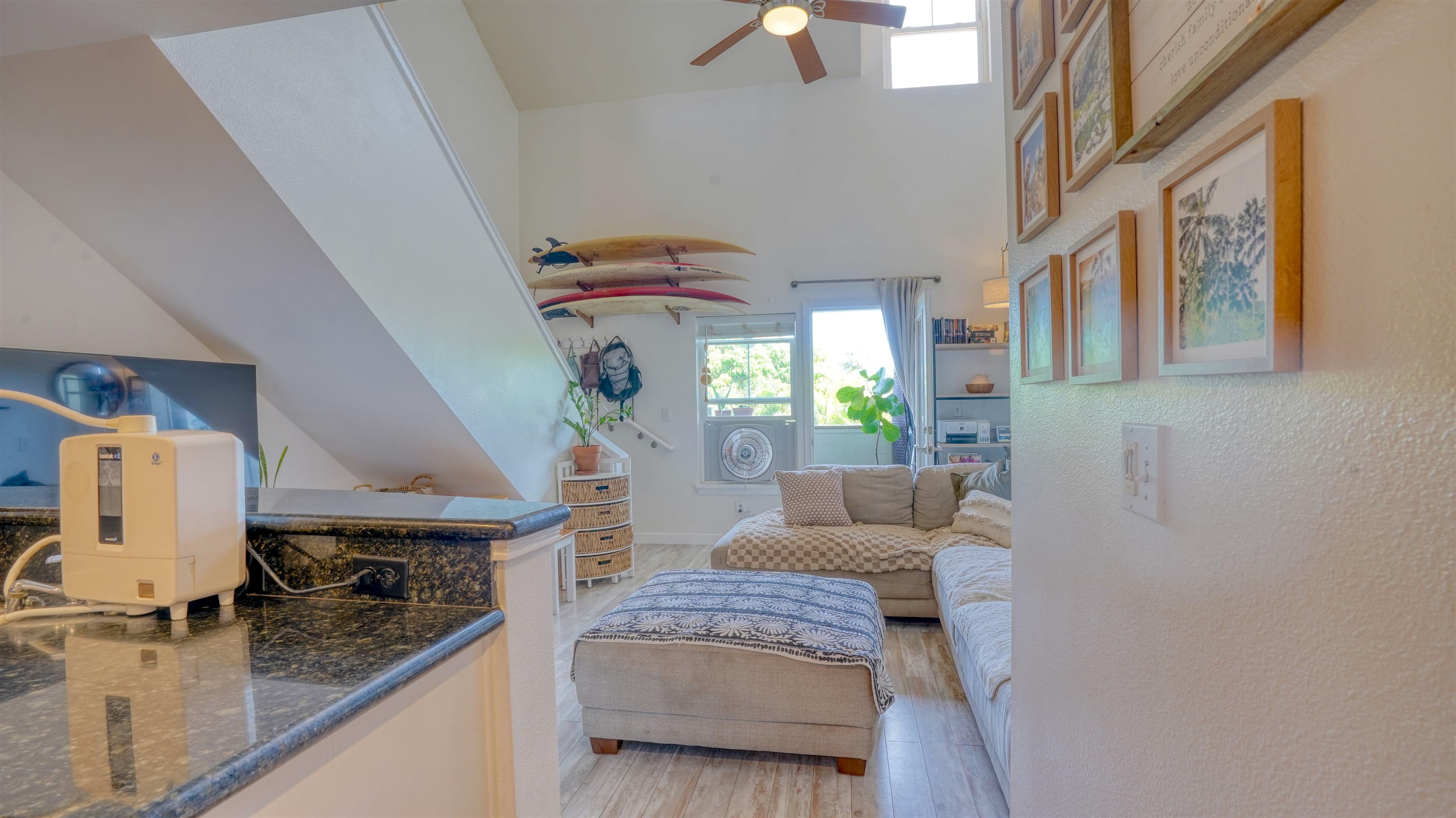 3710 Lower Honoapiilani Road, Unit F44 Lahaina, HI 96761 - Photo 7 of 41 a living room with furniture and a wooden floor