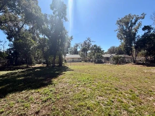 a large yard with green space