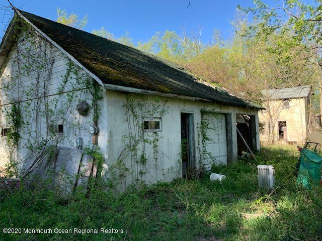 319 Fairfield Road Freehold, NJ 07728 - Photo 6 of 6 a front view of a house with a yard