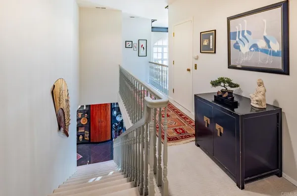 a view of a hallway with workspace