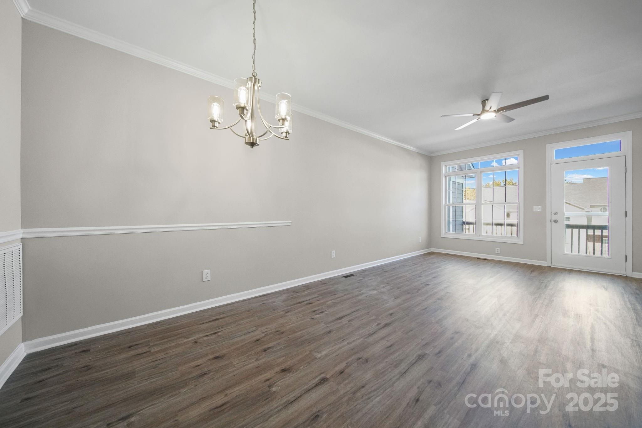 115 Sun Ridge Drive Mooresville, NC 28117 - Photo 12 of 30 wooden floor in an empty room with a window