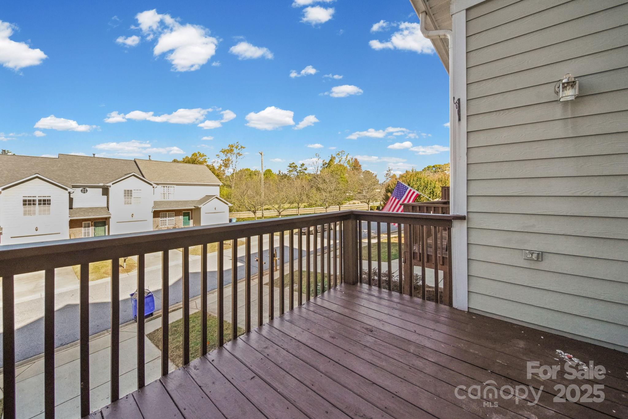 115 Sun Ridge Drive Mooresville, NC 28117 - Photo 14 of 30 a view of a balcony with wooden floor