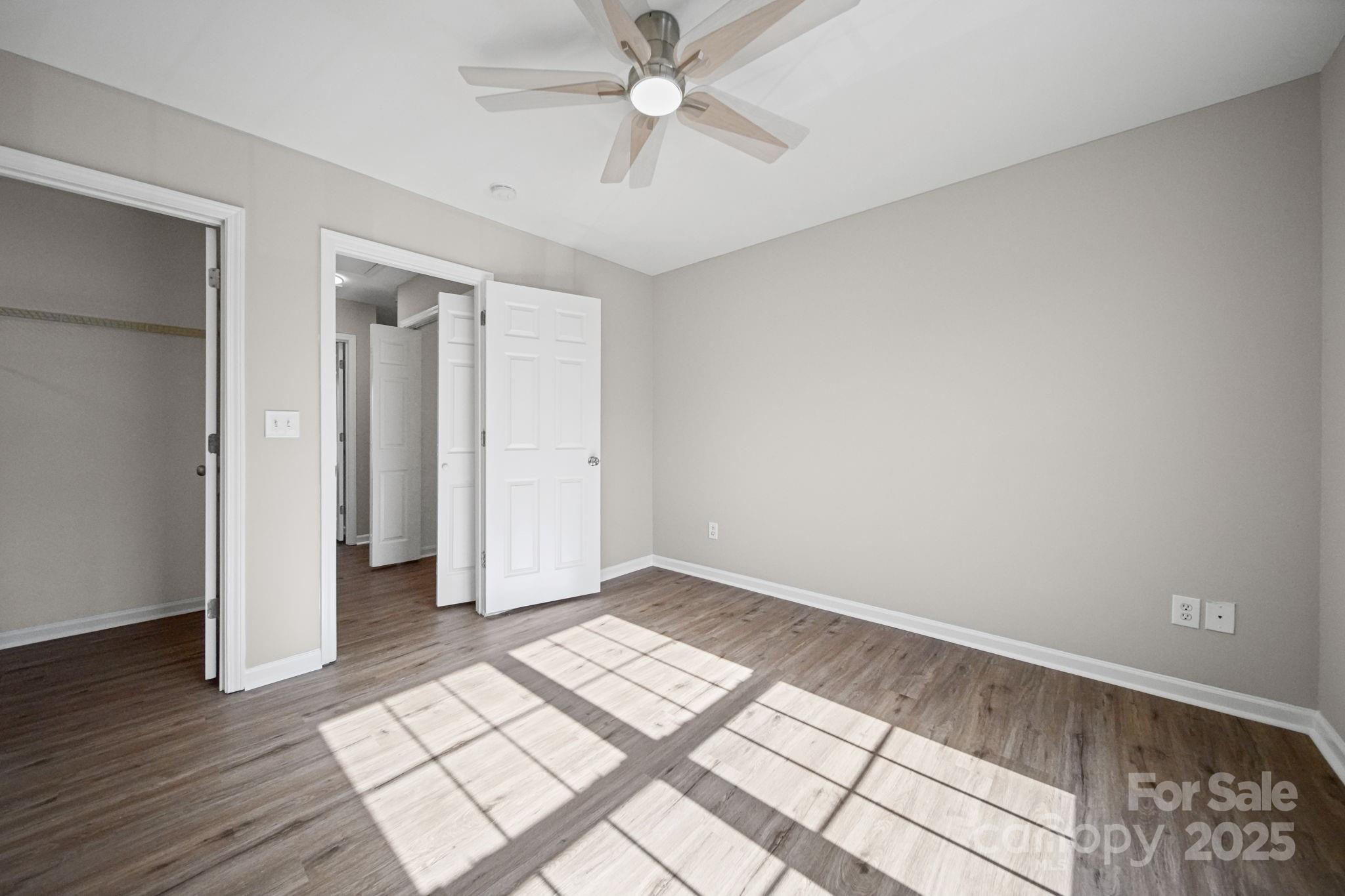 115 Sun Ridge Drive Mooresville, NC 28117 - Photo 20 of 30 wooden floor in an empty room with a window