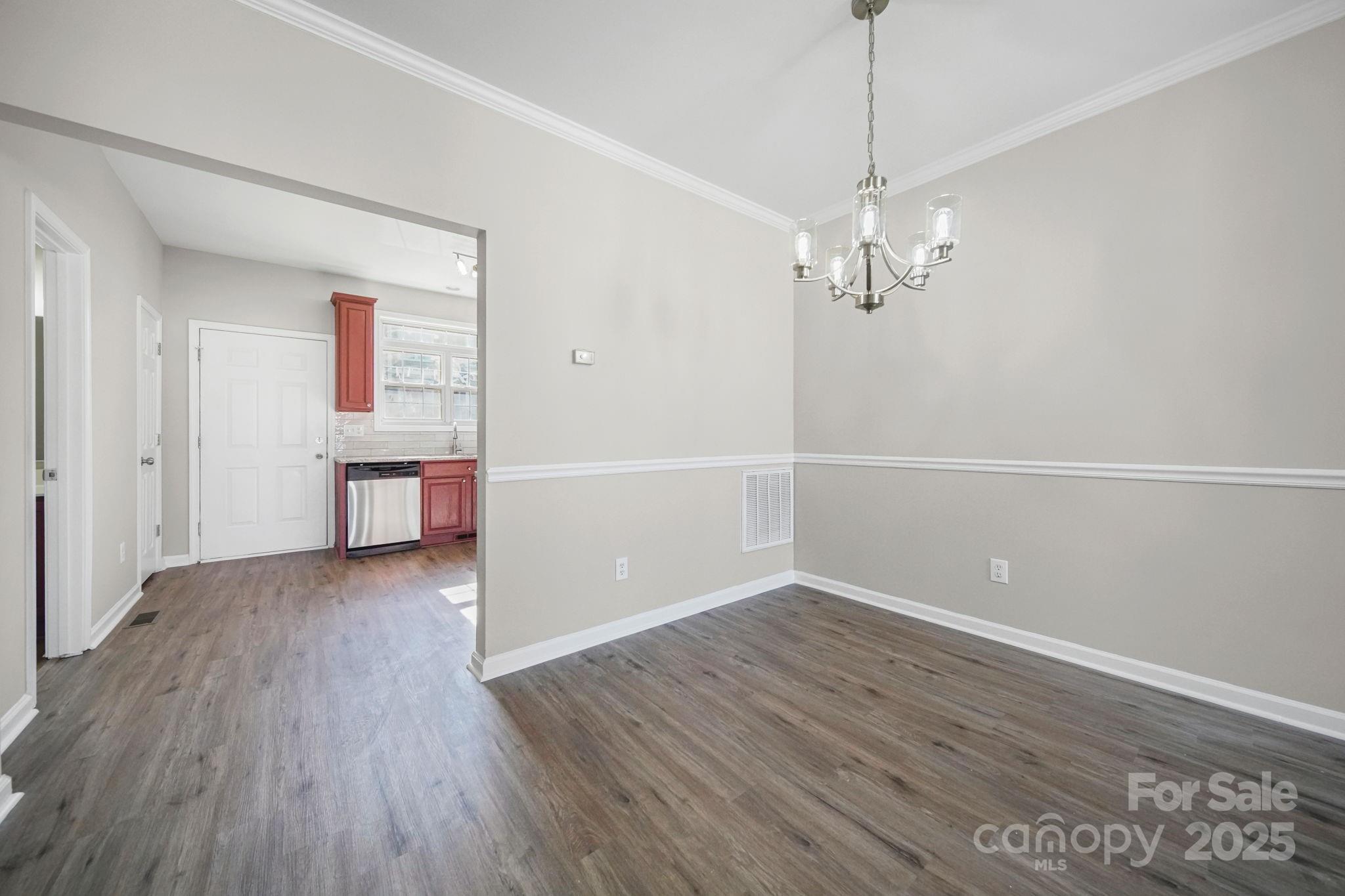 115 Sun Ridge Drive Mooresville, NC 28117 - Photo 9 of 30 wooden floor in an empty room with a window