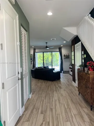 wooden floor with a living room