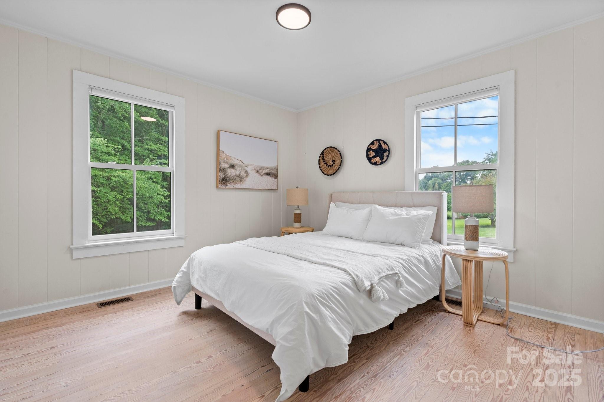 2704 Kool Park Road Northeast Hickory, NC 28601 - Photo 11 of 23 a bedroom with a bed and a window