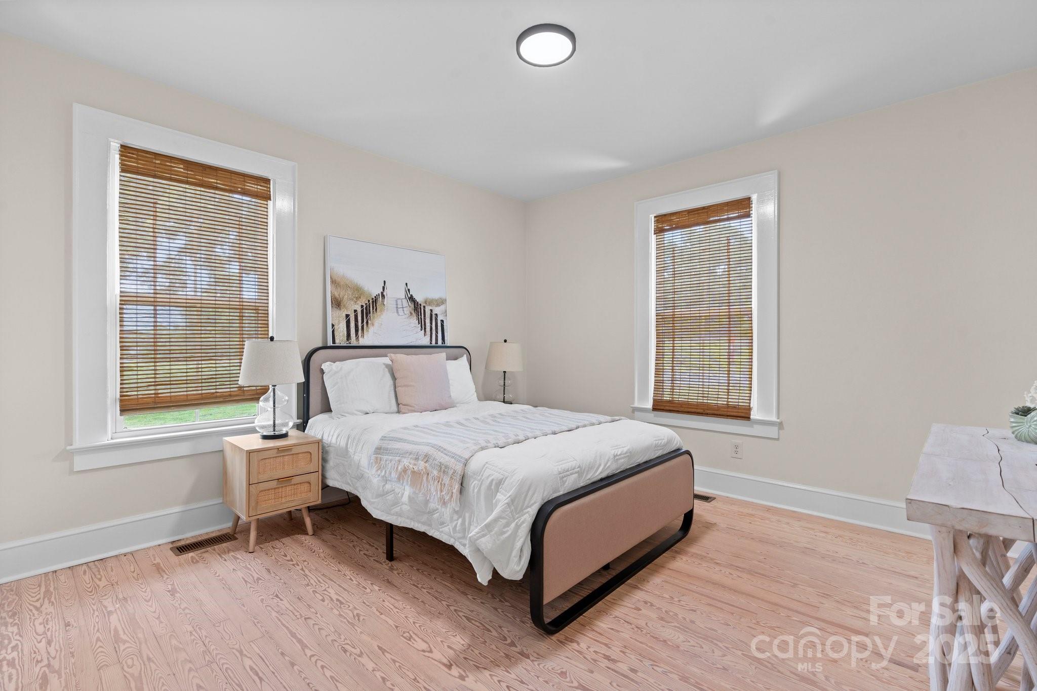 2704 Kool Park Road Northeast Hickory, NC 28601 - Photo 15 of 23 a bedroom with a bed and window