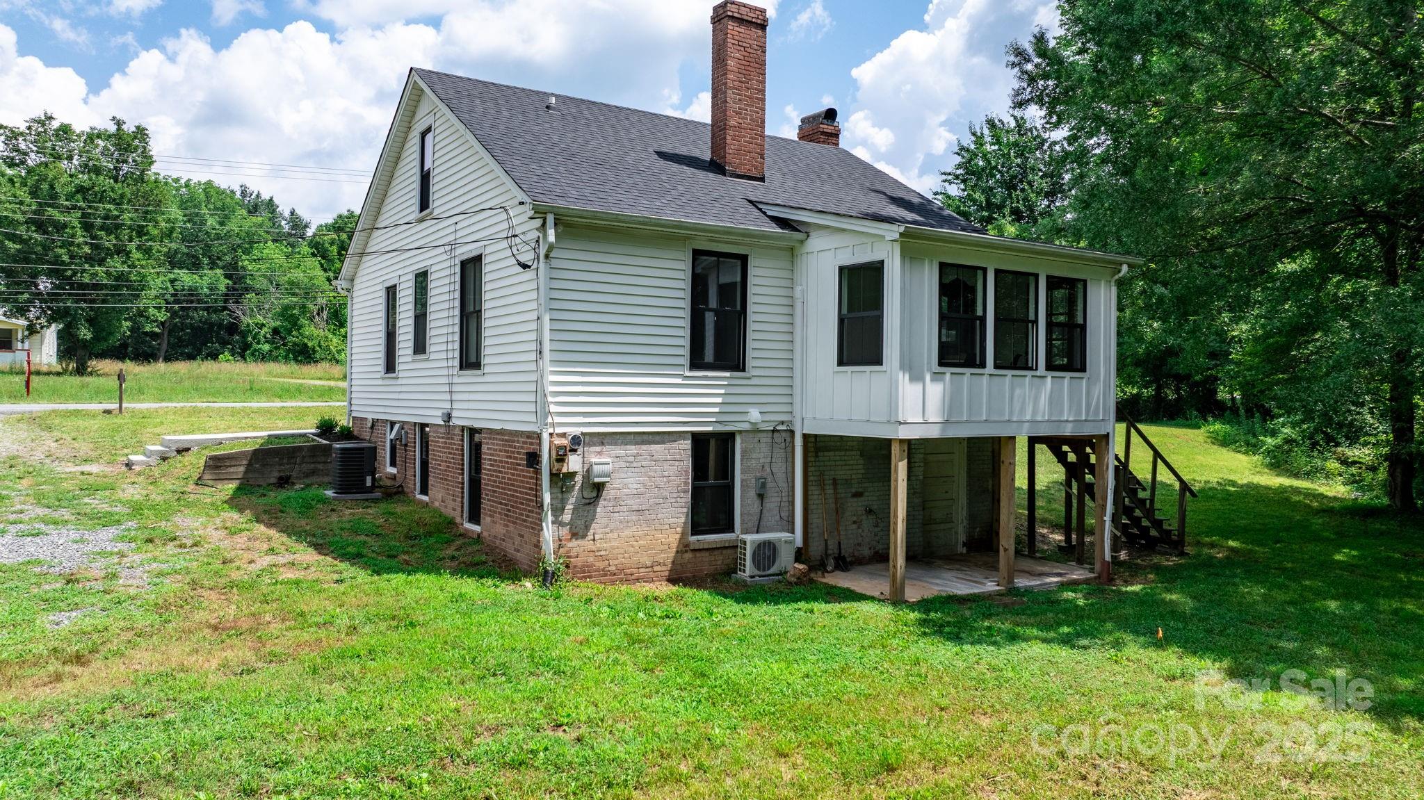 2704 Kool Park Road Northeast Hickory, NC 28601 - Photo 19 of 23 a view of a house with a backyard