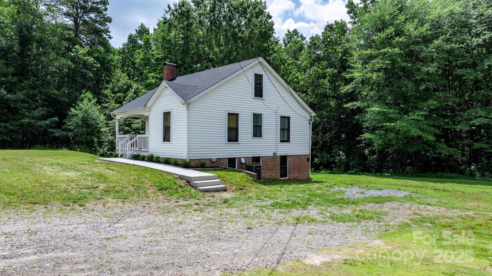 2704 Kool Park Road Northeast Hickory, NC 28601 - Photo 21 of 23 a view of a house with a yard