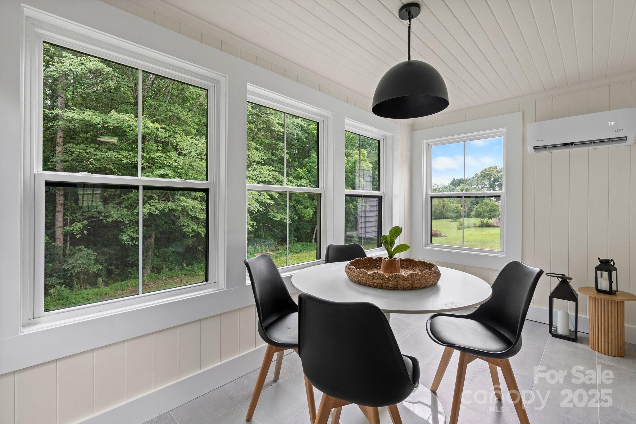 2704 Kool Park Road Northeast Hickory, NC 28601 - Photo 9 of 23 a dining room with furniture and window
