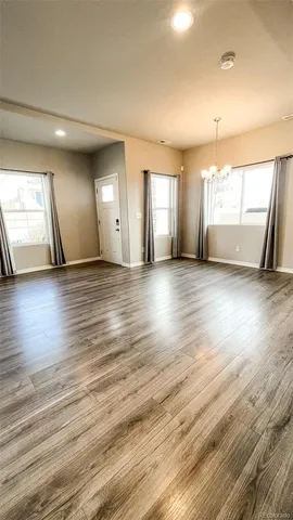 a spacious bathroom with a double vanity sink and a mirror