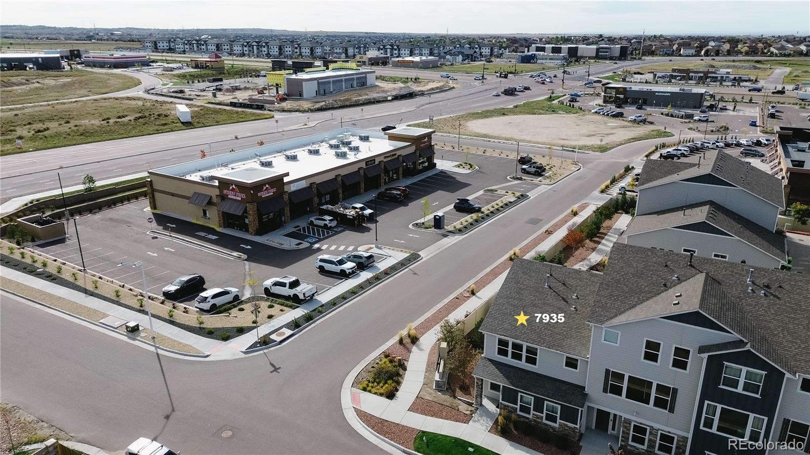7935 Shilo Mesa Drive Colorado Springs, CO 80908 - Photo 30 of 30 an aerial view of a house