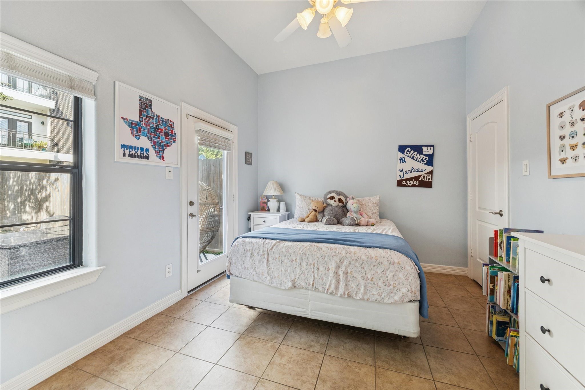 3203 Garden Oaks View Houston, TX 77018 - Photo 8 of 13 a bedroom with a bed and a window