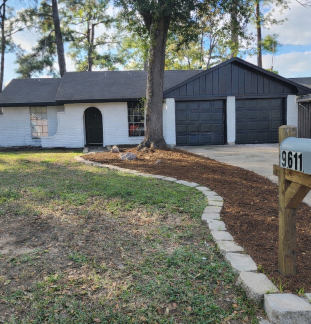 a house view with a backyard space