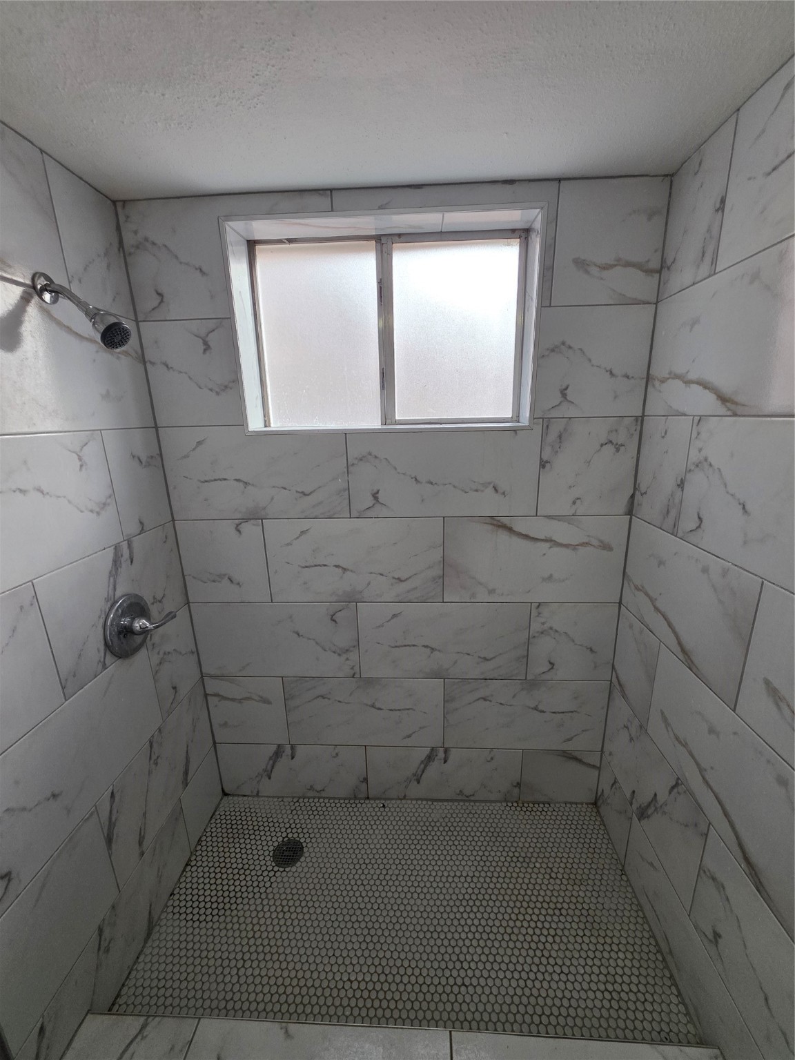 9611 Jaywood Street Houston, TX 77040 - Photo 14 of 22 a bathroom with a shower